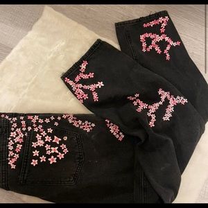 Painted cherry blossom on jeans